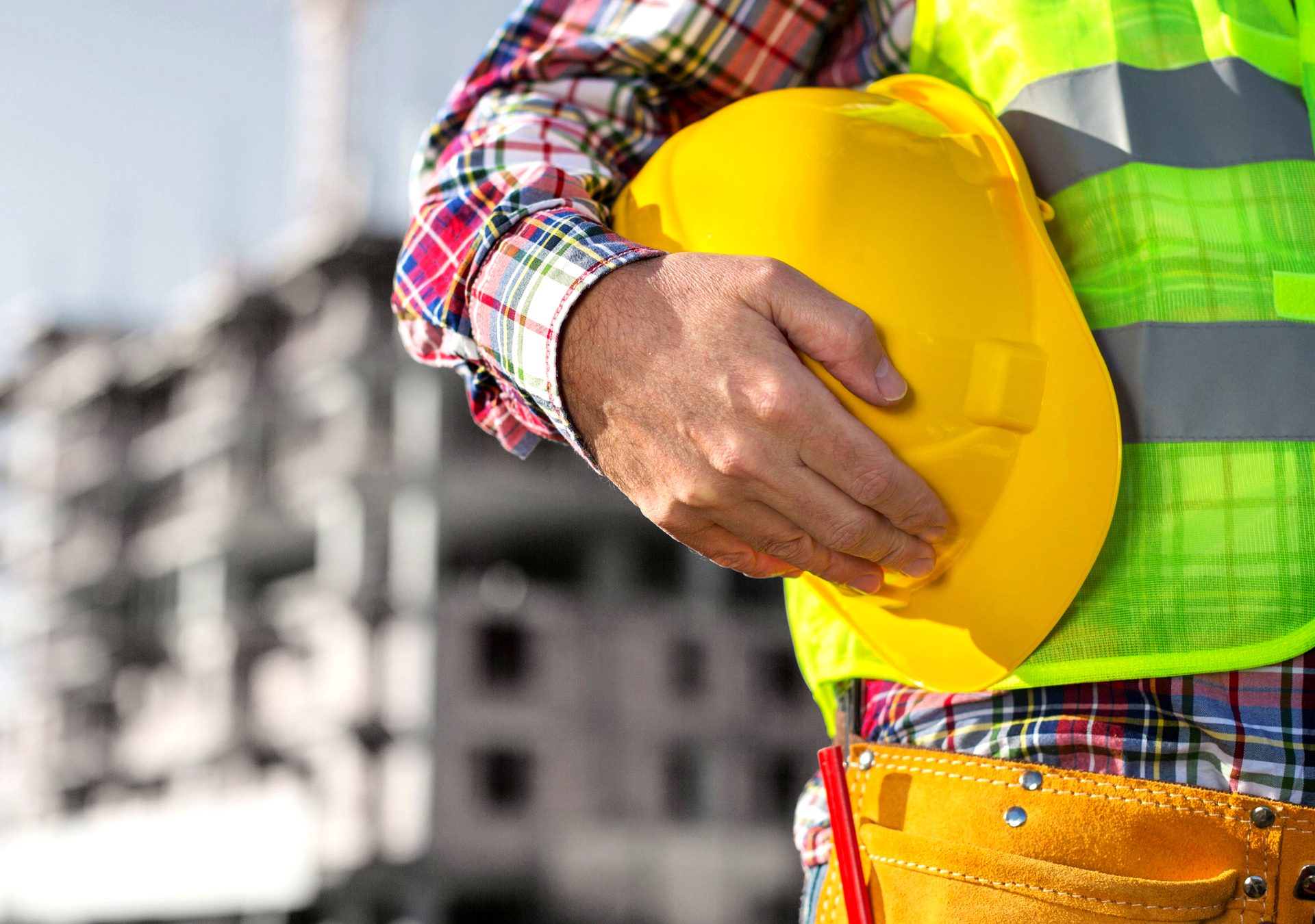 Industrial contractor with hard hat — Raycap Holdings partners with industrial distribution business owners across the United States
